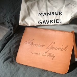 Mansur Gavriel logo clutch NEW. NEVER USED.